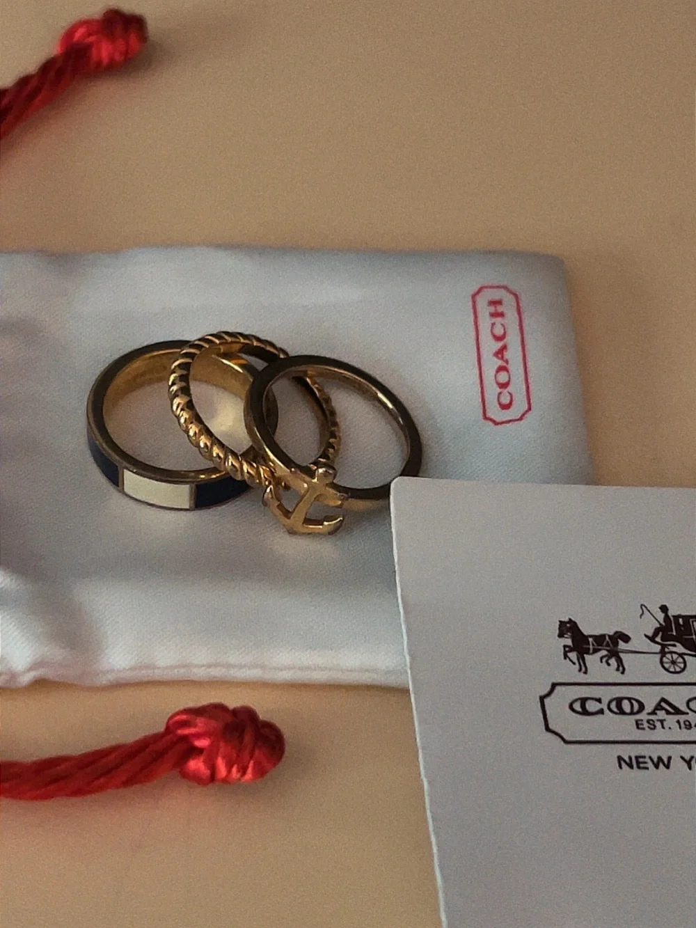 Coach Stackable Ring Trio with Gold Anchor, Rope, and Navy and Cream Inlay bands